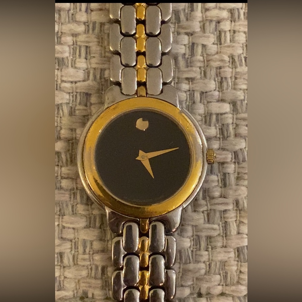 Ladies Movado S/S-14k qtz watch black dial